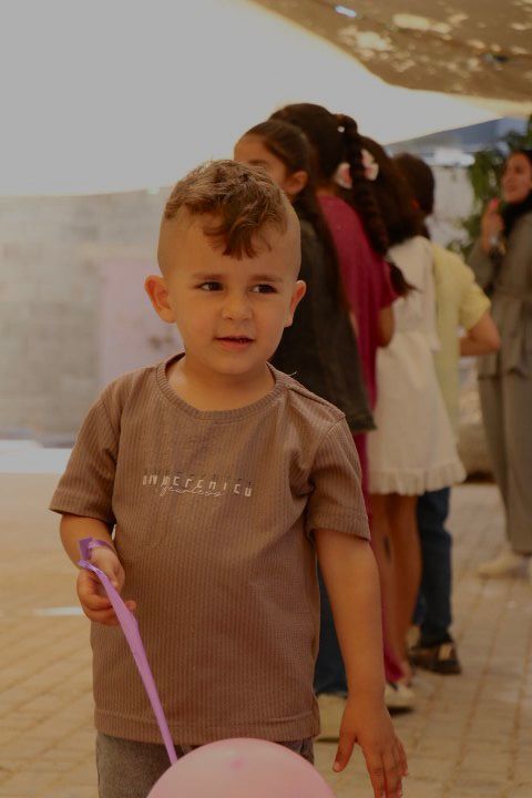 لجنة الحماية المجتمعية في أم صفا تنظم يوما ترفيهيا للأطفال